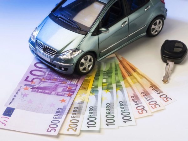 Car With Key And Bills